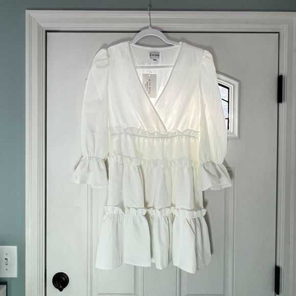 In The Style x Billie Faiers wrap over flutter sleeve tiered mini dress in white - Picture 4 of 7